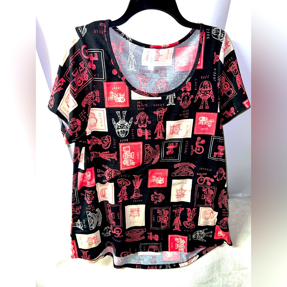 Lularoe Disney Classic Toy Story Black Salmon white Women’s Size Medium Blouse